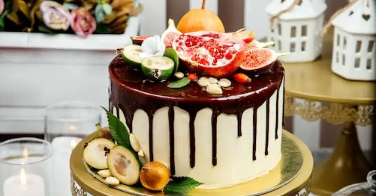 Special Occasion Cake topped with chocolate and multiple fruits