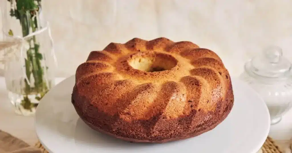 This photo of a bundt cake on a white plate is a delicious reminder of a centuries-old tradition.