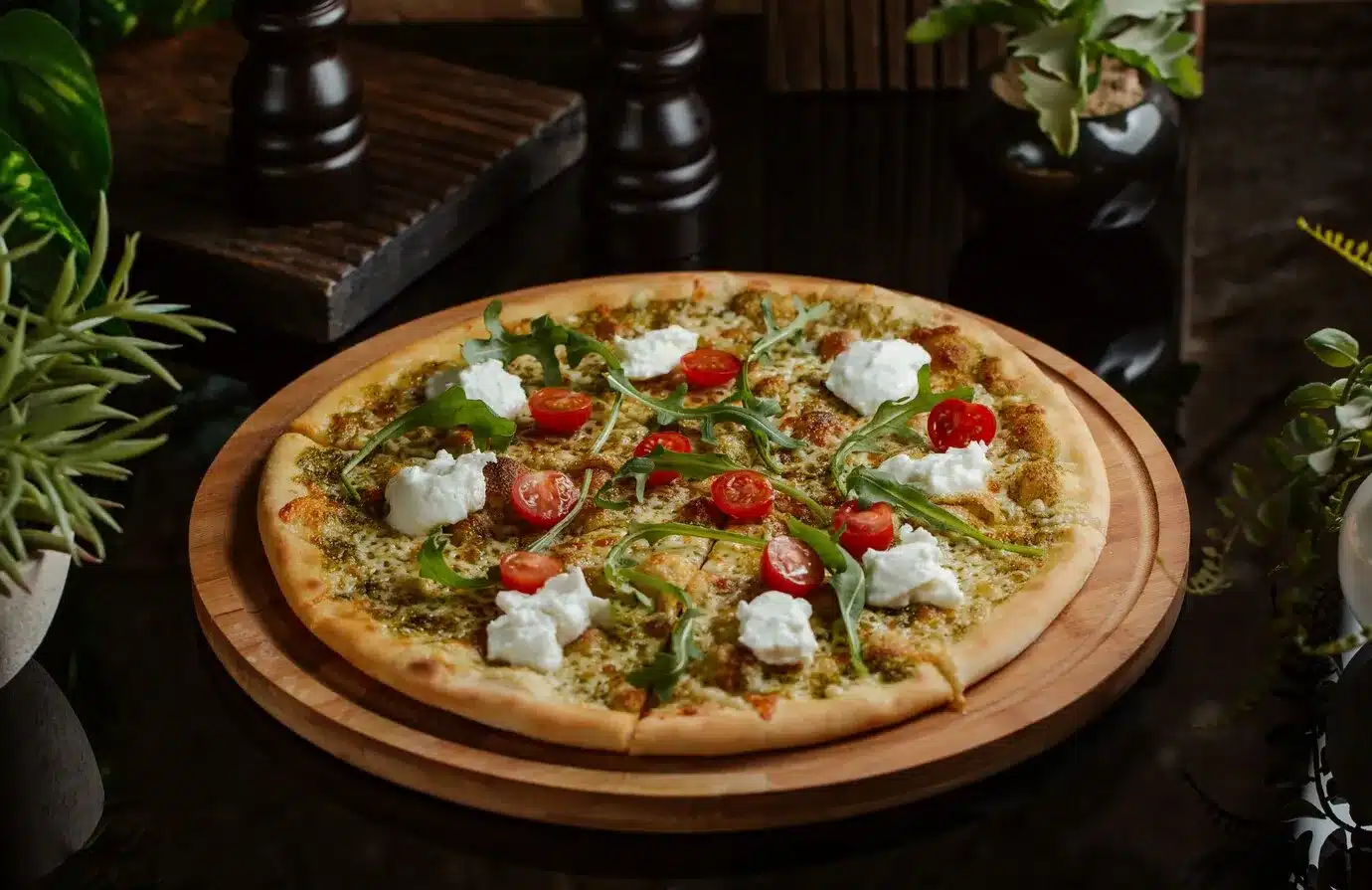 vegetable based pizza with white cheese and cherries